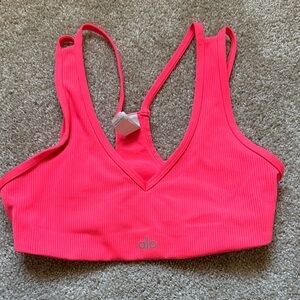 ALO Yoga Ribbed V-Neck Sports Bra in Neon Pink